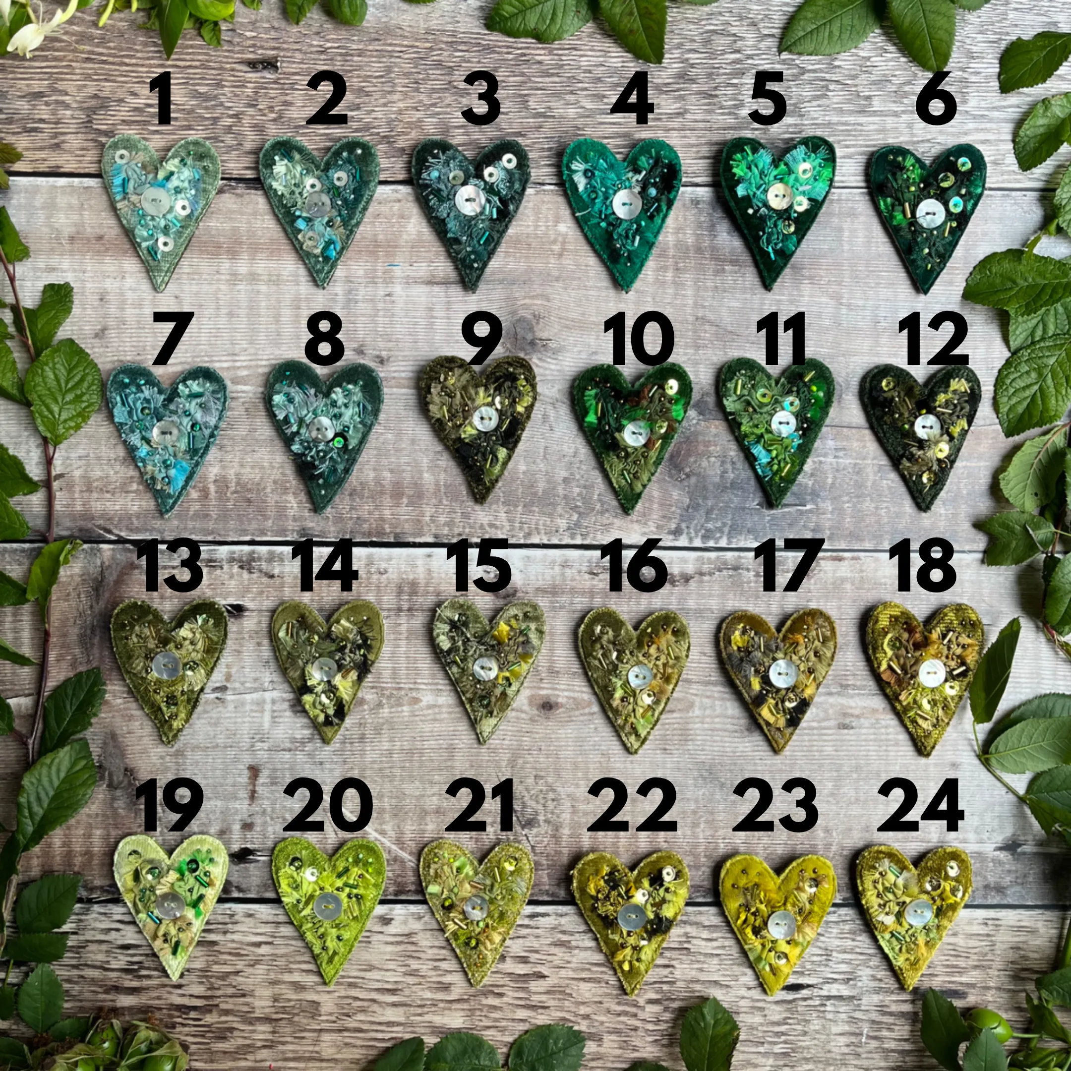 Fabric heart brooches in greens