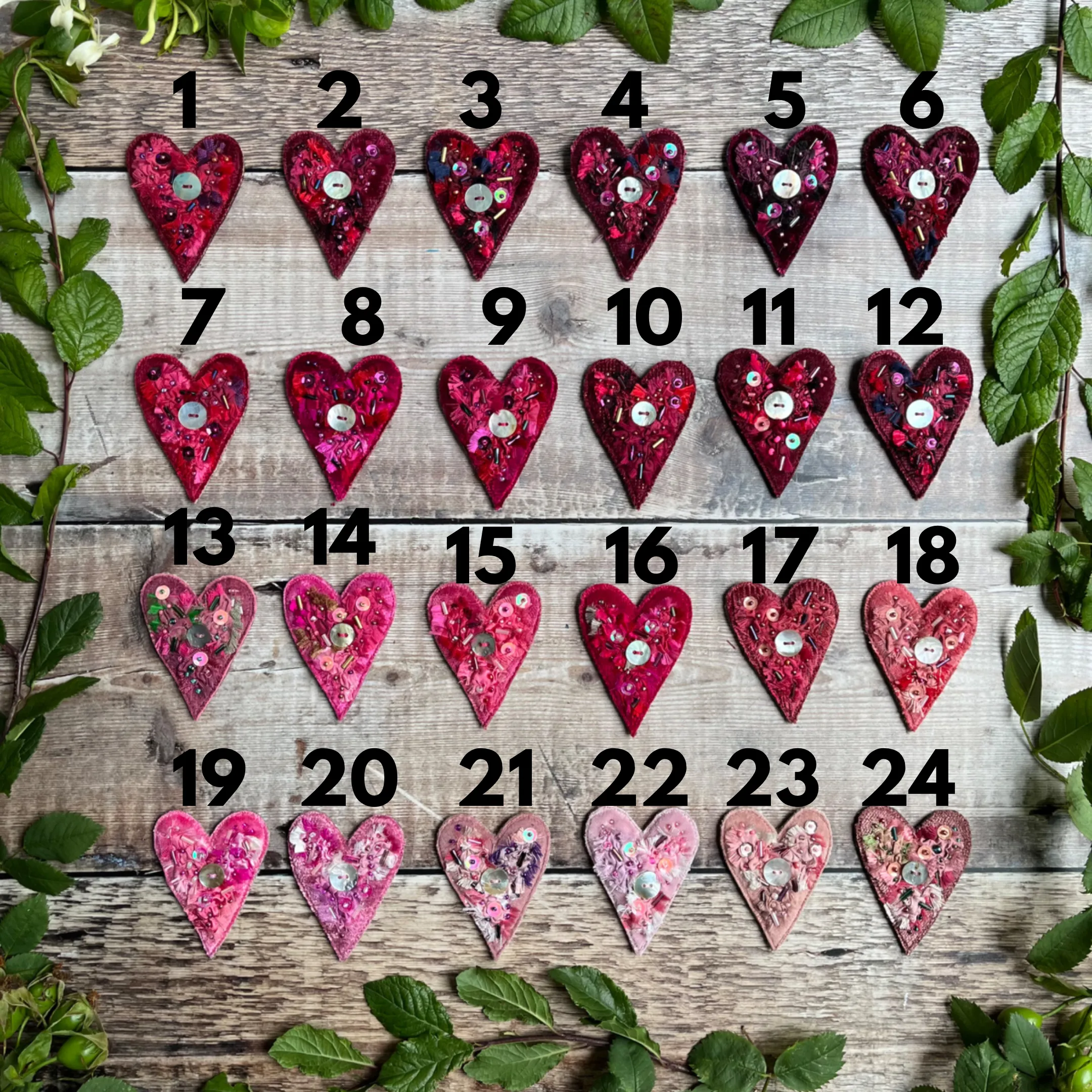 Fabric heart brooches in pinks